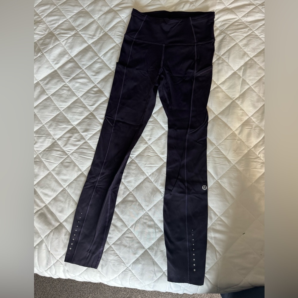 Lululemon fast and free tight. Size 4. Color dark plum!